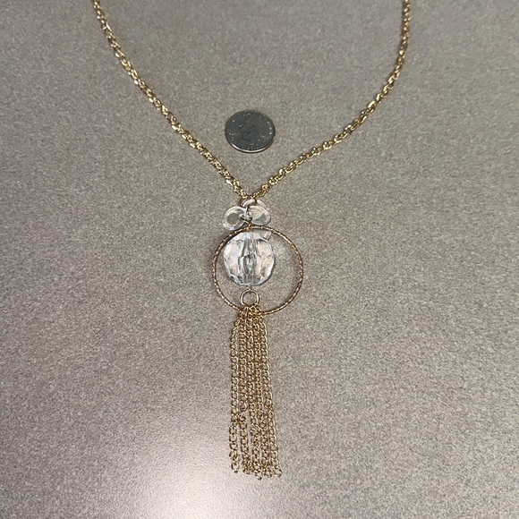 Gold colored necklace with clear faceted plastic bead and four flat round beads - Picture 3 of 4